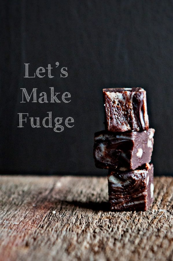 Stack of fudge on a wood table with dark background