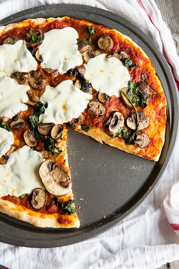 Ingredients for a really simple pizza dough recipe and Sautéed Spinach and Mushroom Pizza.