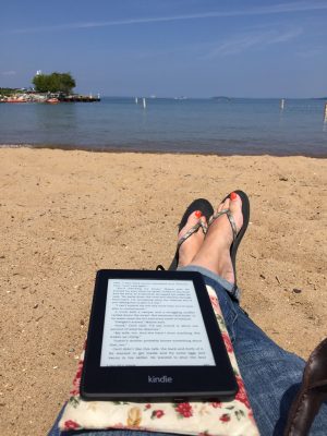 Reading my Kindle Paperwhite in Traverse City Michigan