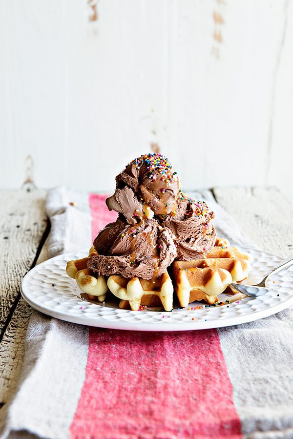 Homemade Dessert Waffles are the perfect base for a chocolate sundae! Find the recipe on dineanddish.net