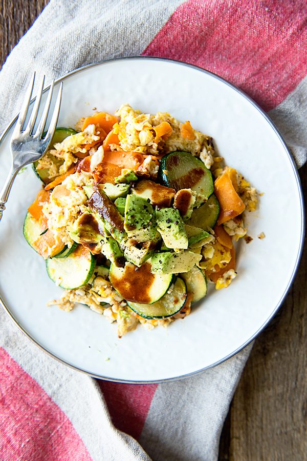 Avocado Sweet Potato Hash Recipe on a white plate with linen towel