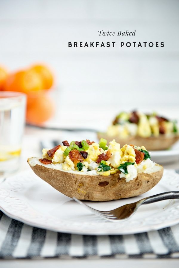 Twice Baked Breakfast Potatoes served on a white plate with a white brick background