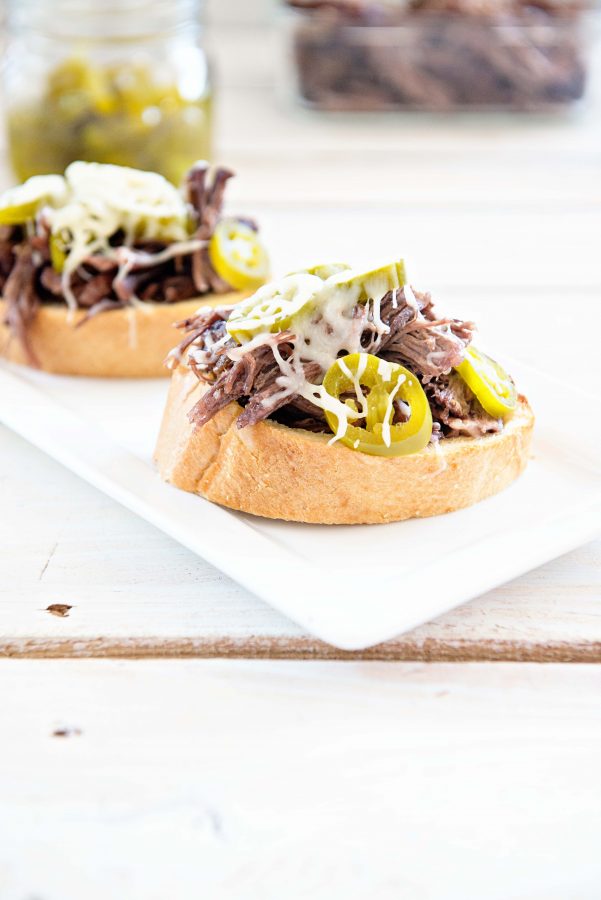 These simple slow cooker roast beef sandwiches will become a favorite to make for your family!