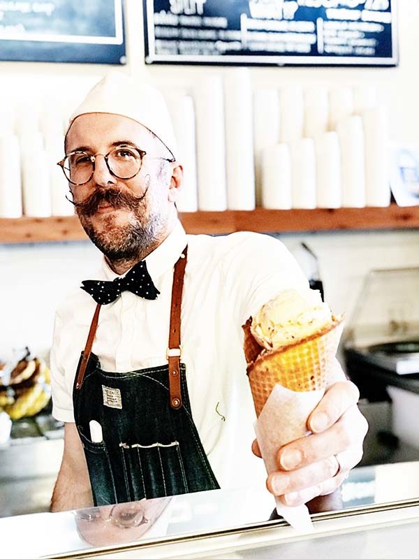 Coneflower Creamery Ice Cream and Owner with Handlebar Mustache part of Omaha Culinary Tours
