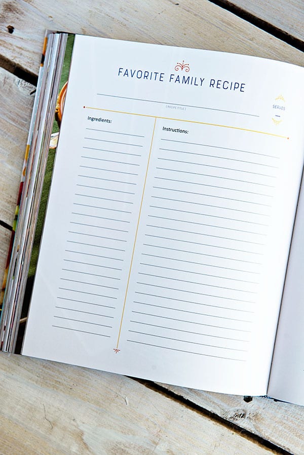 An open cookbook page on a white wooden background