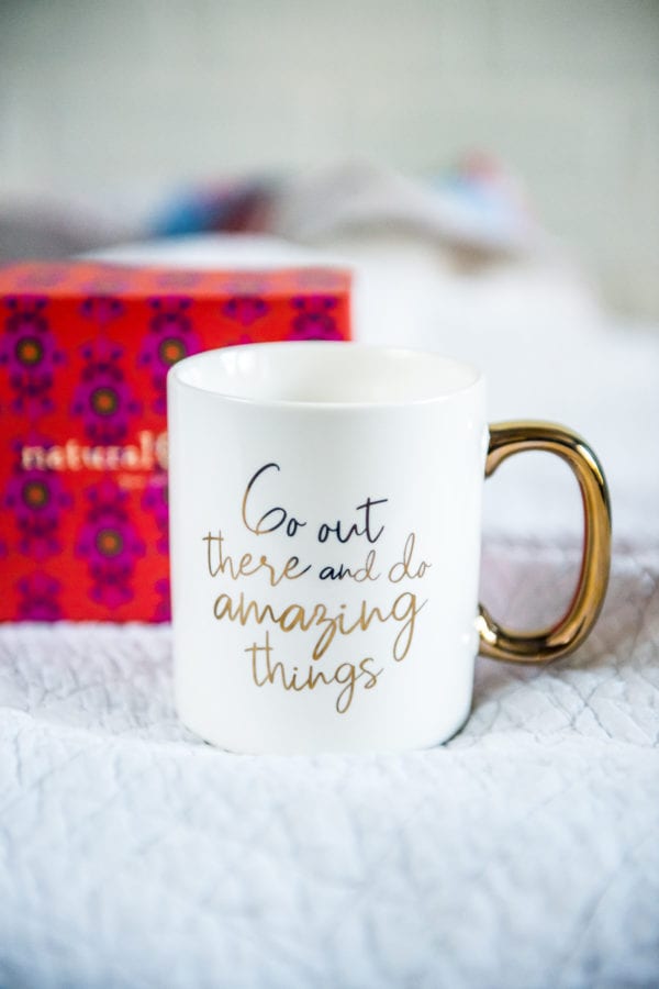 Natural Life Coffee Mug that says Go Out There And Do Amazing Things