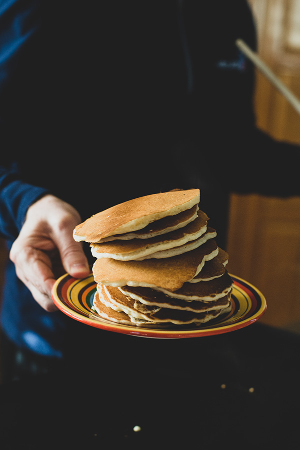 Big Batch Pancakes on a colorful plate. 