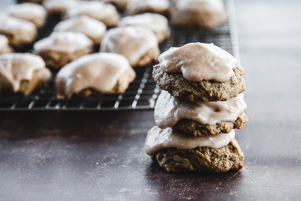 Image is a stack of chocolate cookies on a dark surface